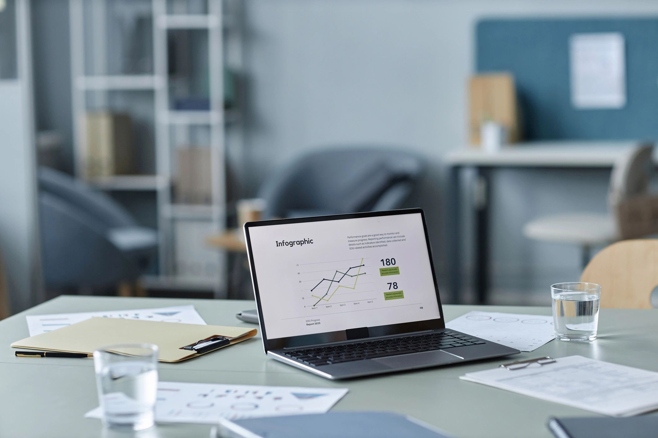Organized bookkeeping workspace with laptop and financial documents