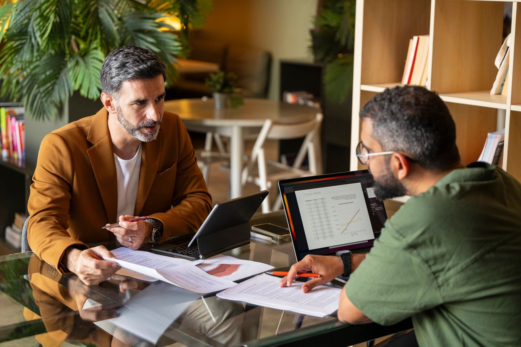 Finance professionals reviewing documents together